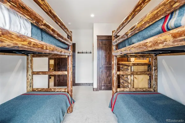 a bed room with a bed and a window