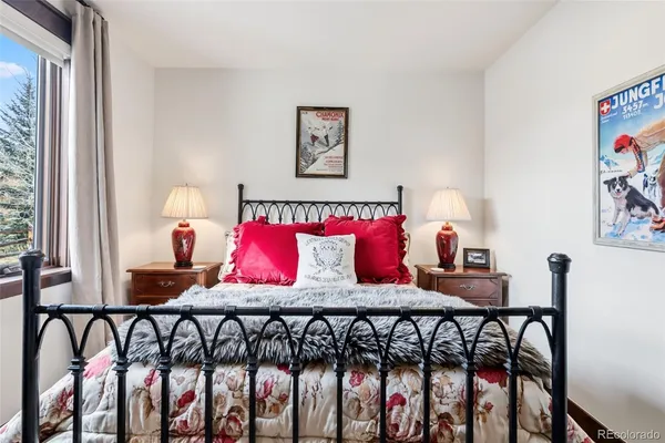 a bedroom with furniture and a bed