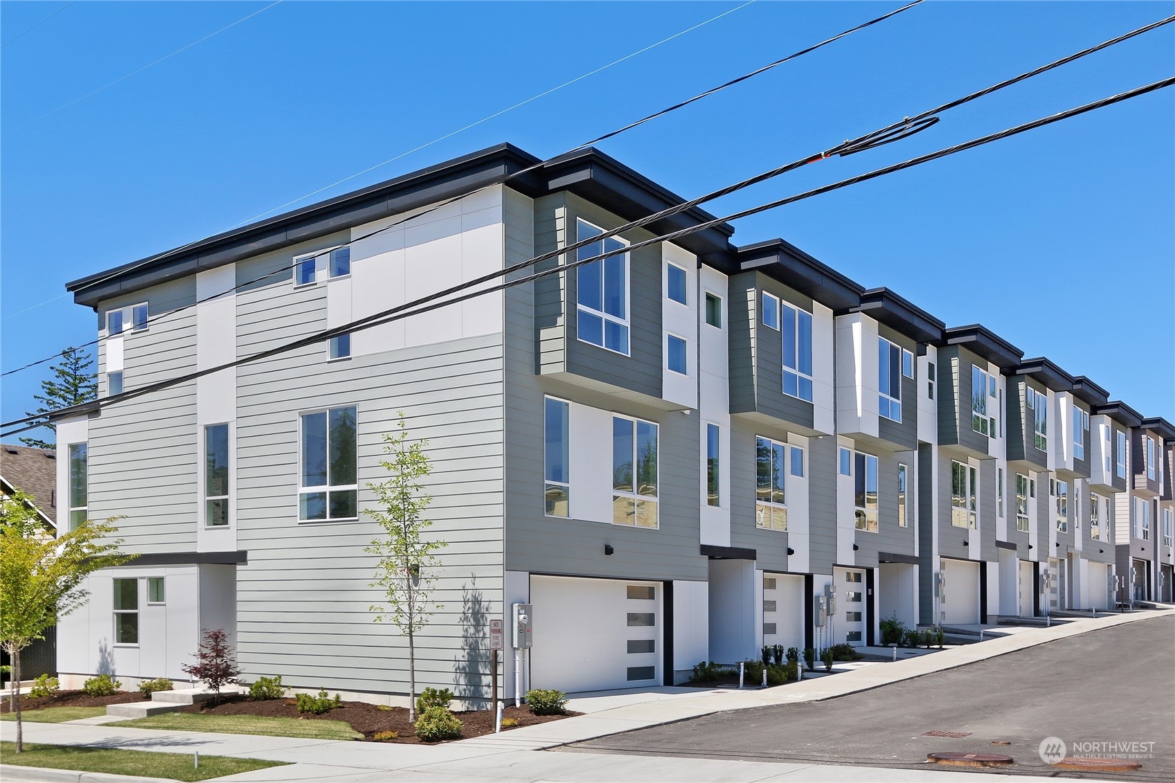 2527 Gibson Road, Unit A6 Everett, WA 98204 - Photo 21 of 24 a front view of a building with a street