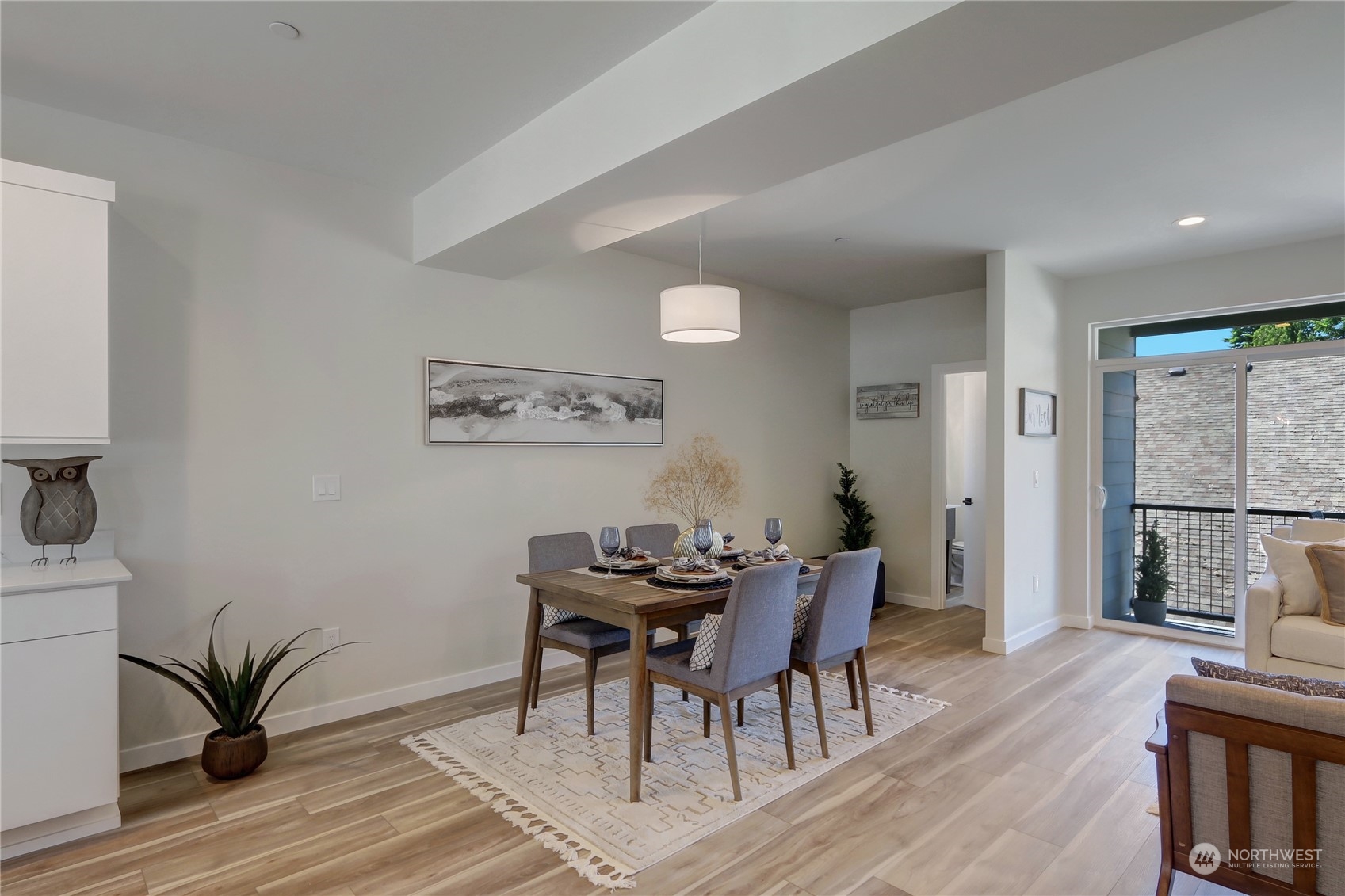 2527 Gibson Road, Unit A6 Everett, WA 98204 - Photo 7 of 24 a view of a dining room with furniture and wooden floor