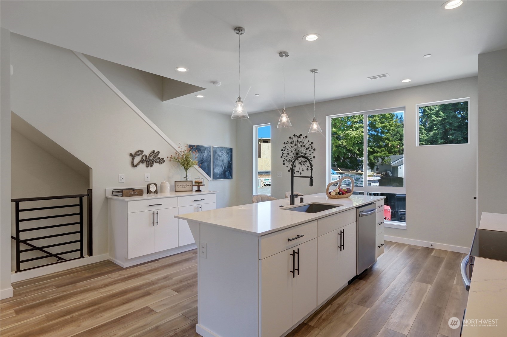 2527 Gibson Road, Unit A6 Everett, WA 98204 - Photo 9 of 24 a kitchen with a sink stove and cabinets
