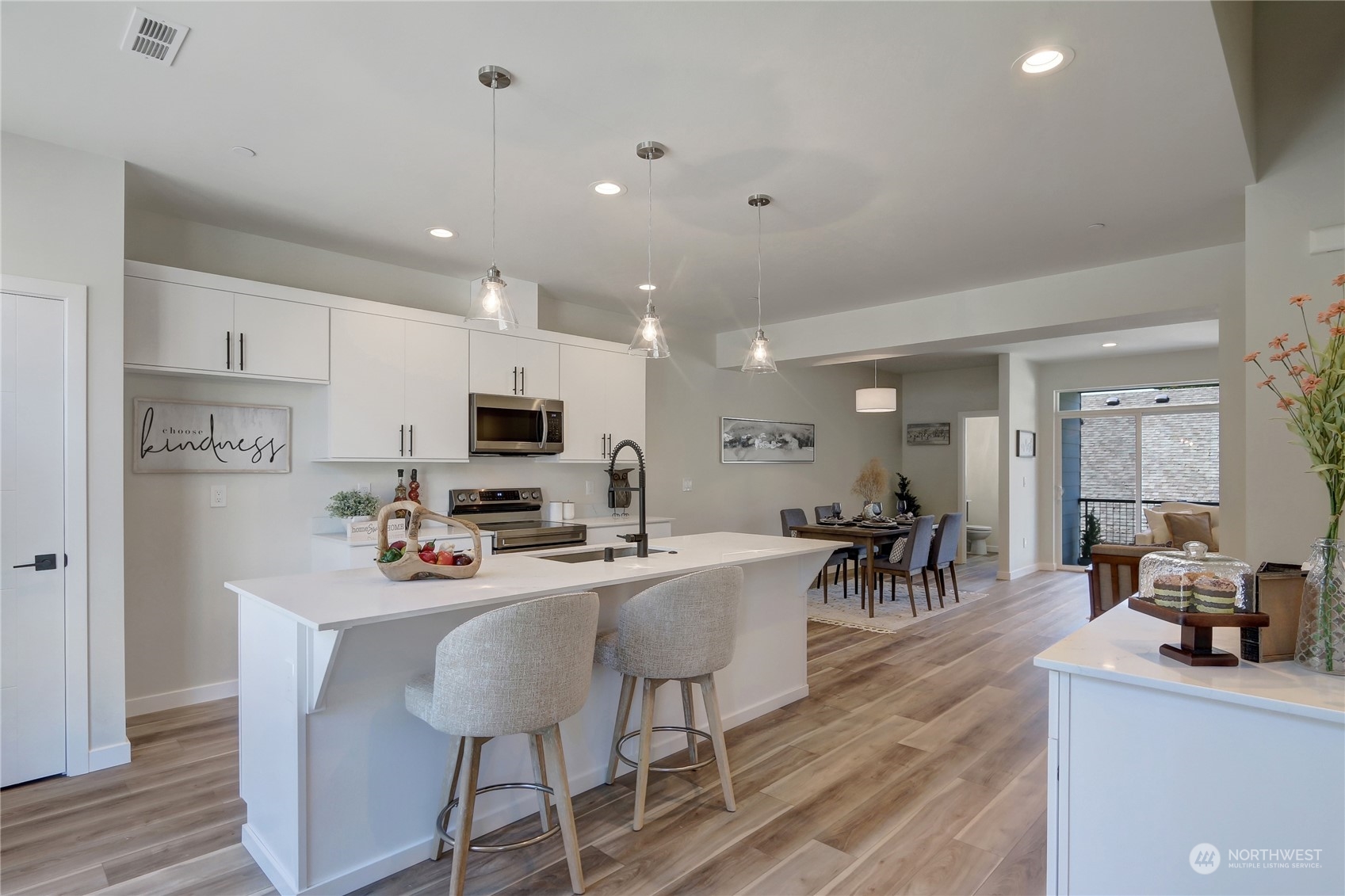 2527 Gibson Road, Unit A6 Everett, WA 98204 - Photo 10 of 24 a view of a dining room with furniture and wooden floor
