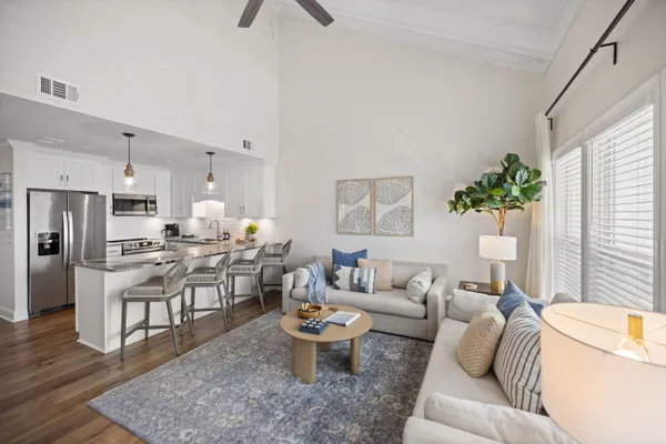 a living room with furniture and a table