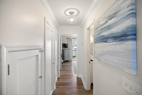 a bedroom with a large bed and a tv