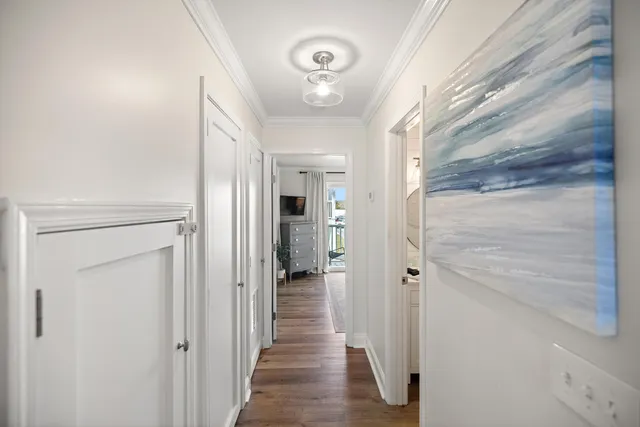 a bedroom with a large bed and a tv