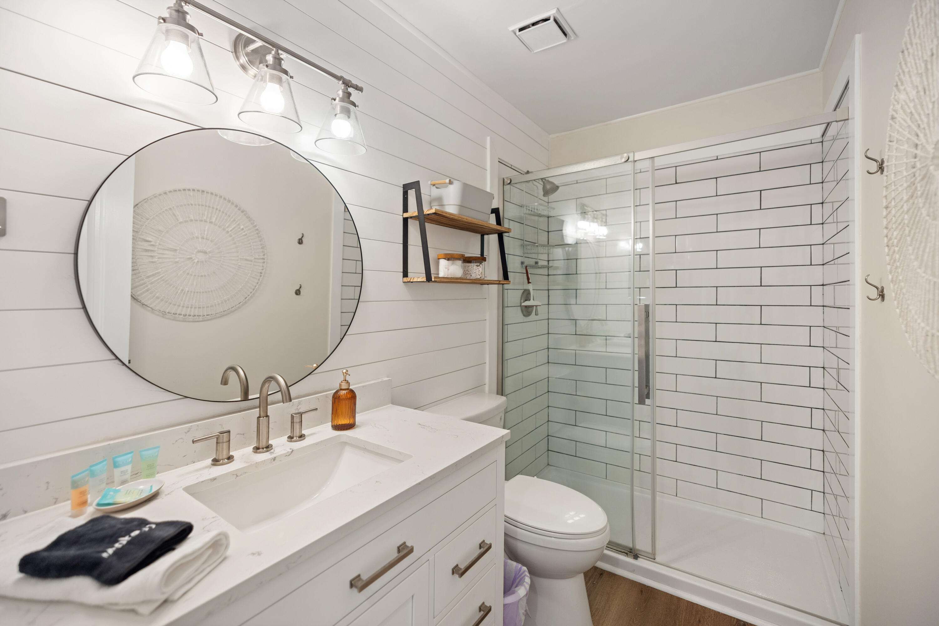 17670 Front Beach Road, Unit L7 Panama City Beach, FL 32413 - Photo 24 of 69 a bathroom with a sink a toilet and shower