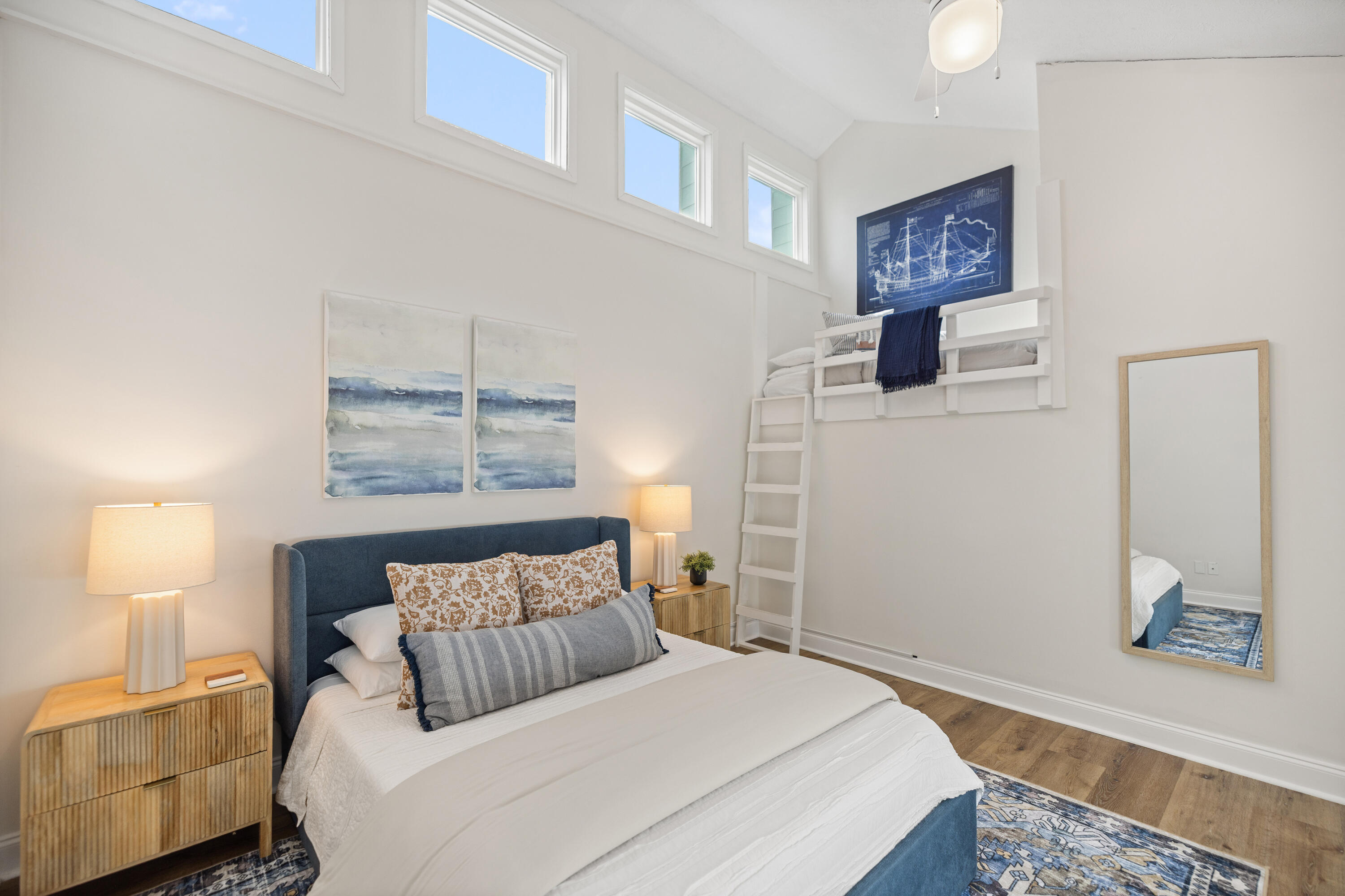 17670 Front Beach Road, Unit L7 Panama City Beach, FL 32413 - Photo 30 of 69 a bedroom with a bed and a night stand