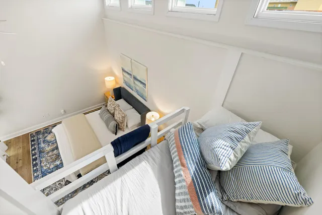 a view of a balcony with potted plants