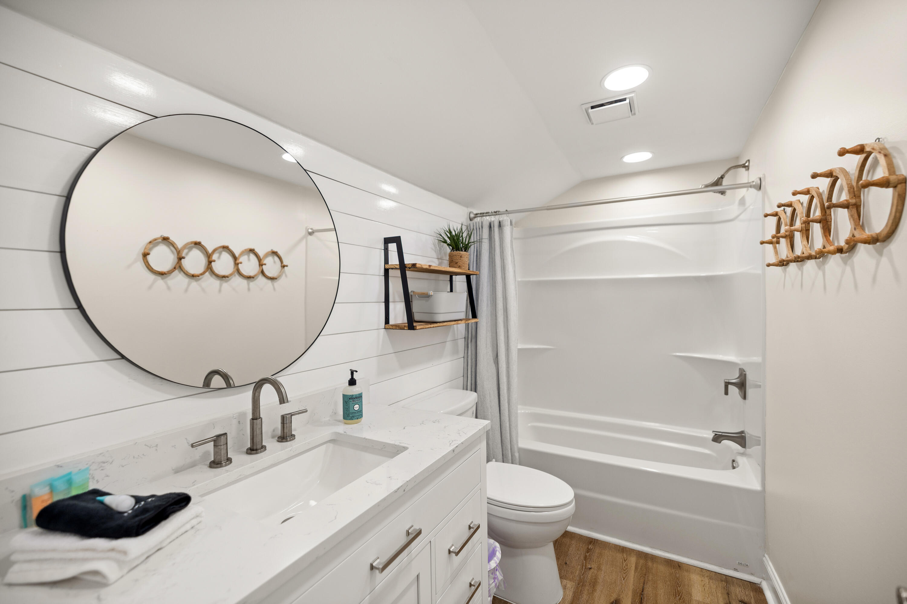 17670 Front Beach Road, Unit L7 Panama City Beach, FL 32413 - Photo 35 of 69 a bathroom with a sink and a mirror