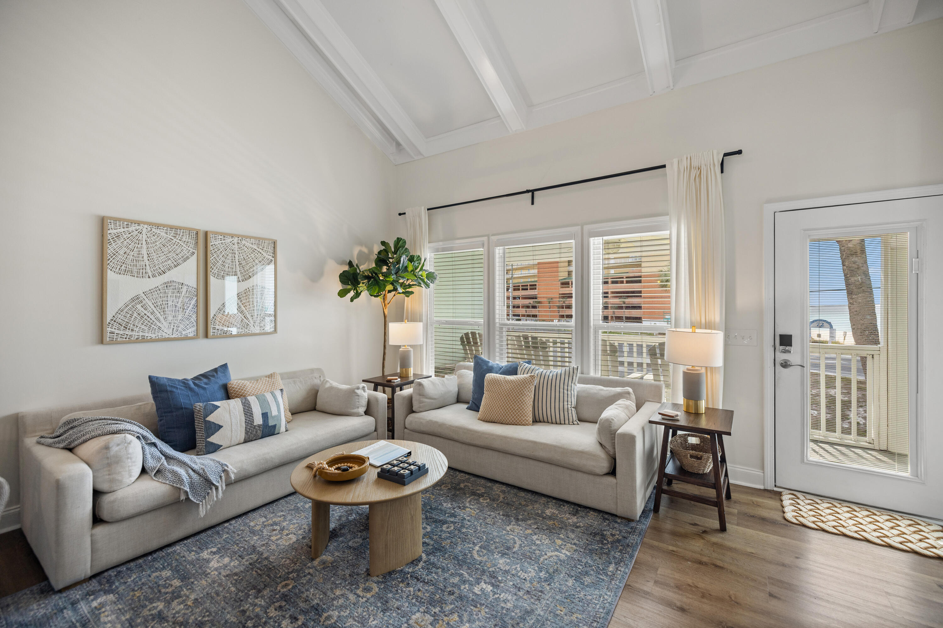 17670 Front Beach Road, Unit L7 Panama City Beach, FL 32413 - Photo 4 of 69 a living room with furniture and a large window