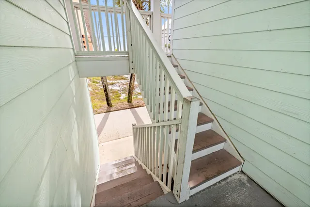 a view of swimming pool from a balcony