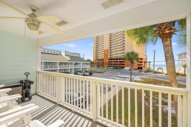 a view of an outdoor space with swimming pool and furniture
