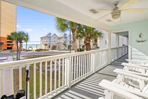 a view of a swimming pool with a lounge chairs