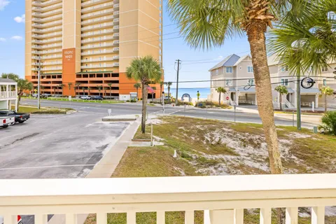 a view of pathway with yard