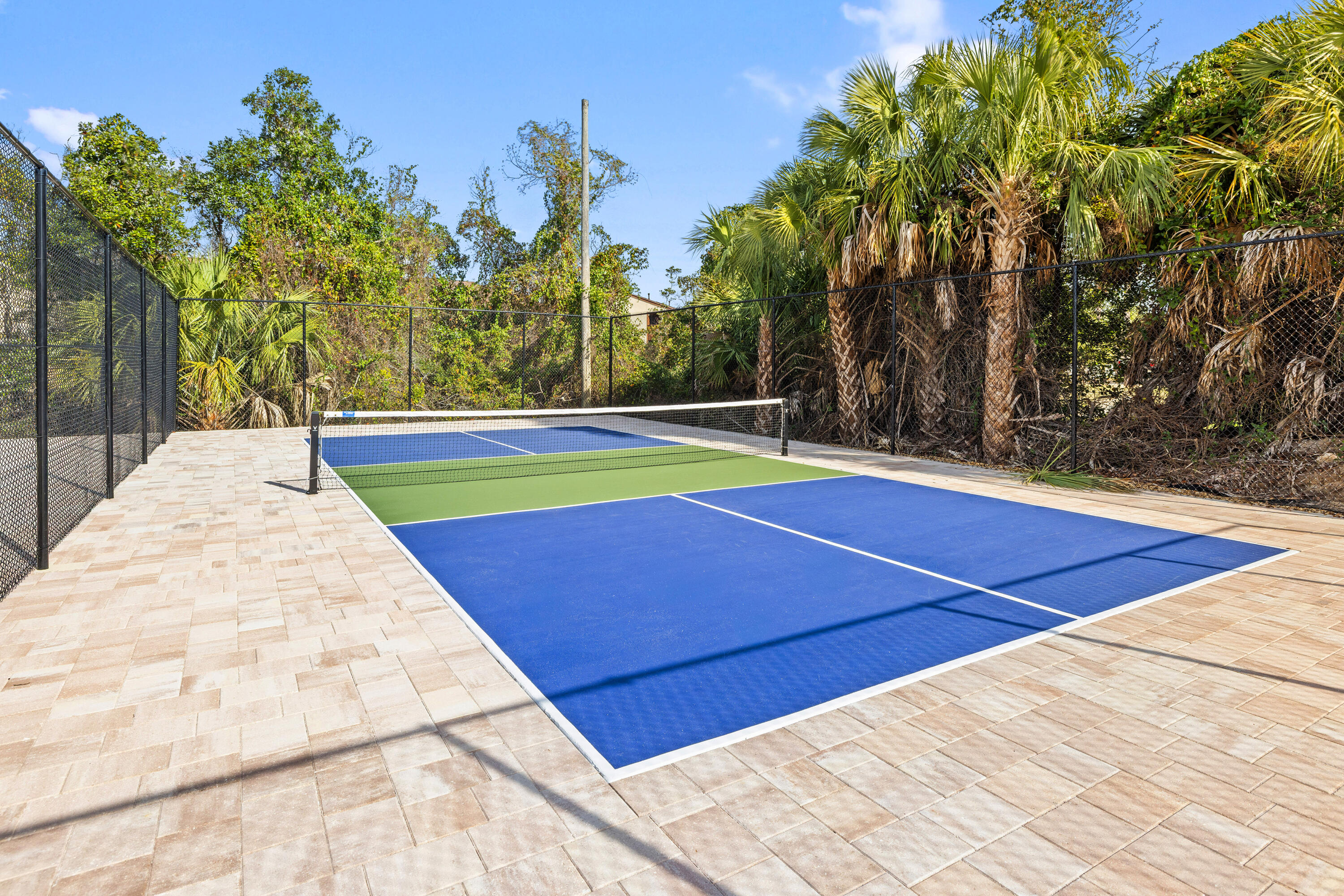 17670 Front Beach Road, Unit L7 Panama City Beach, FL 32413 - Photo 56 of 69 a view of an outdoor space with swimming pool and furniture