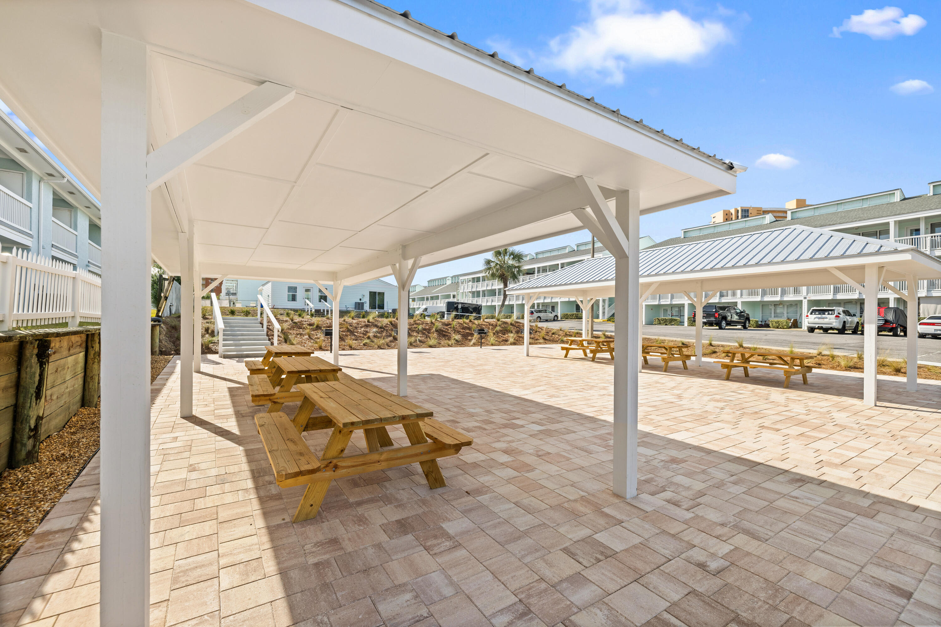 17670 Front Beach Road, Unit L7 Panama City Beach, FL 32413 - Photo 62 of 69 a view of a swimming pool with outdoor seating