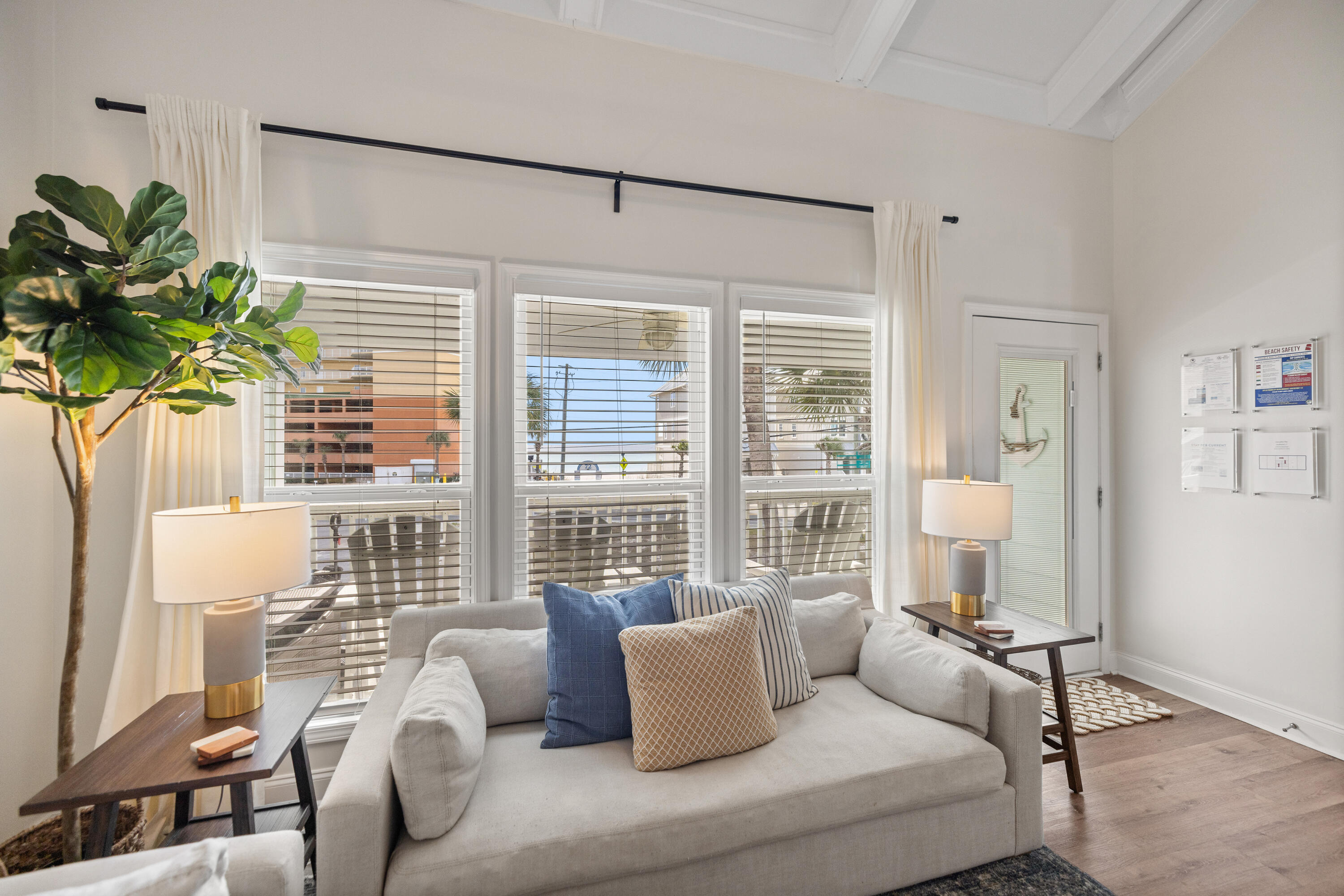 17670 Front Beach Road, Unit L7 Panama City Beach, FL 32413 - Photo 7 of 69 a living room with furniture and a large window
