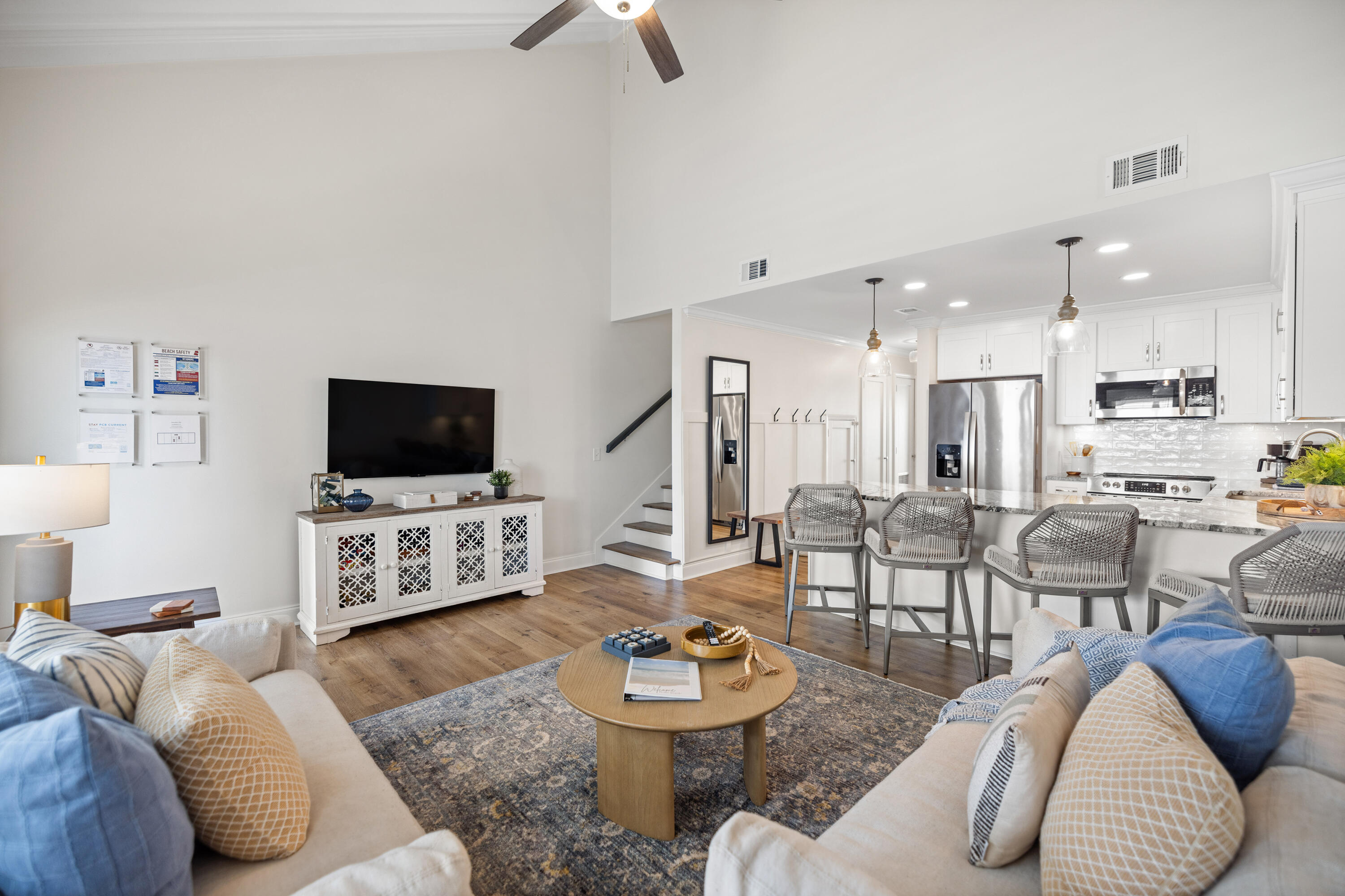17670 Front Beach Road, Unit L7 Panama City Beach, FL 32413 - Photo 9 of 69 a living room with furniture and a flat screen tv