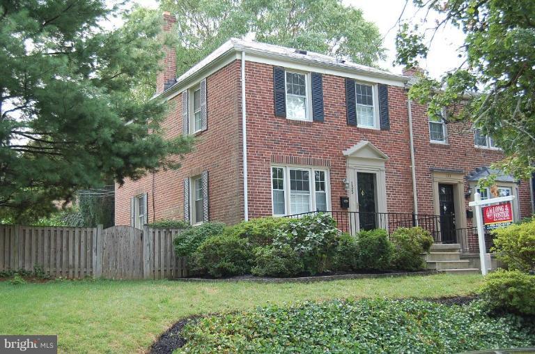 135 Stanmore Road Baltimore, MD 21212 - Photo 1 of 30 a front view of a house with a yard and fence