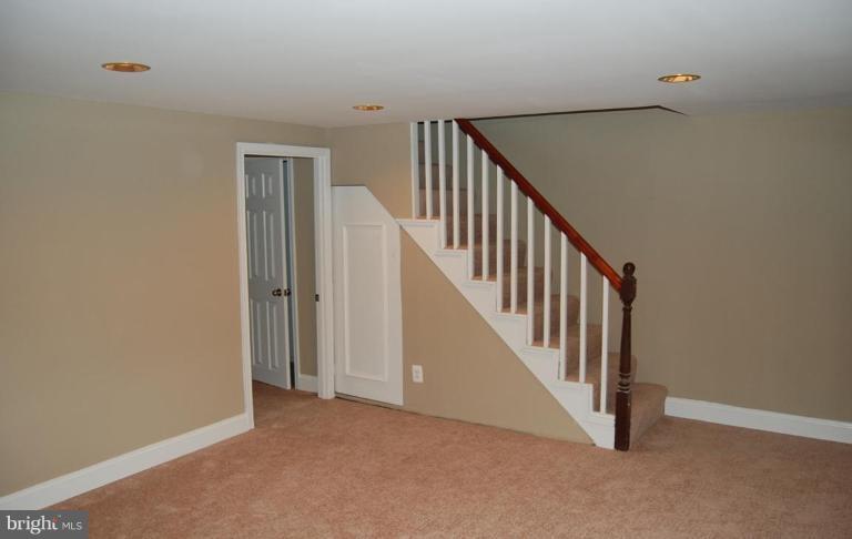 135 Stanmore Road Baltimore, MD 21212 - Photo 26 of 30 a view of a hallway with staircase