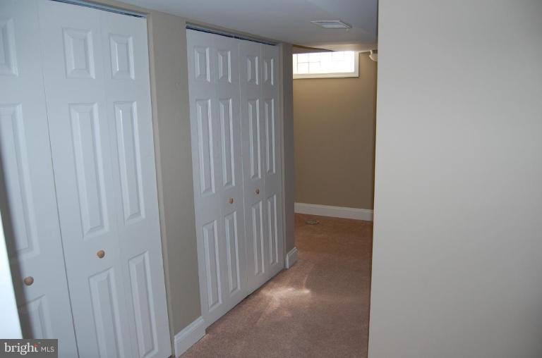 135 Stanmore Road Baltimore, MD 21212 - Photo 28 of 30 a view of a hallway with wooden floor