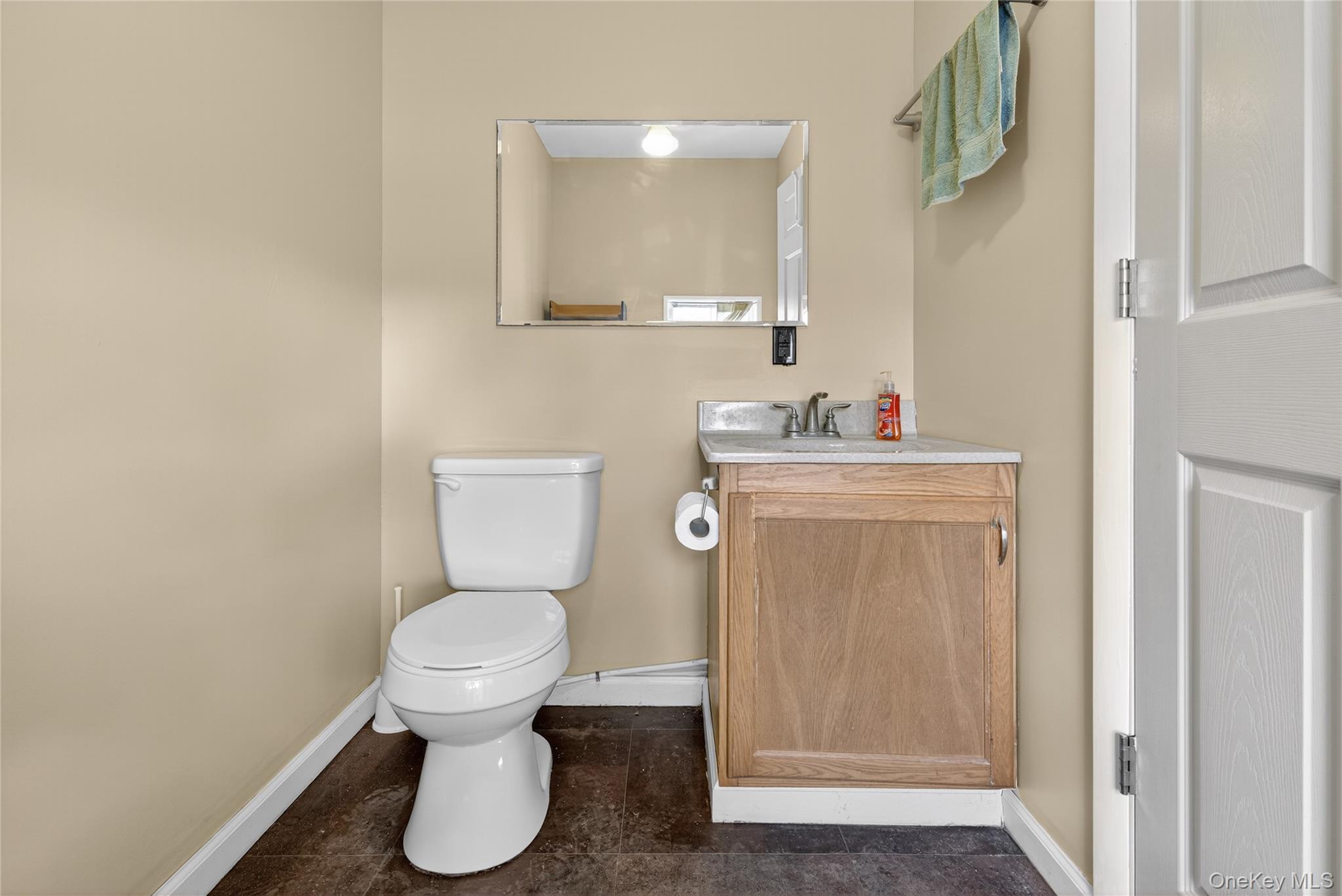 99 Dusinberre Road Gardiner, NY 12525 - Photo 26 of 31 a bathroom with a toilet sink and mirror