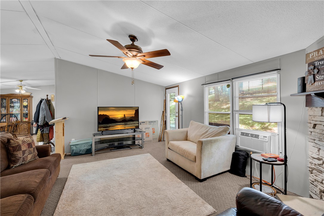 162 Newberry Road Walhalla, SC 29691 - Photo 6 of 50 A relaxed living area with carpeting throughout and a casual, welcoming atmosphere.