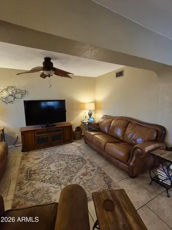 a kitchen with stainless steel appliances granite countertop a sink a stove and a microwave