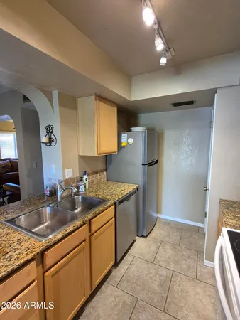 a workspace with furniture and window