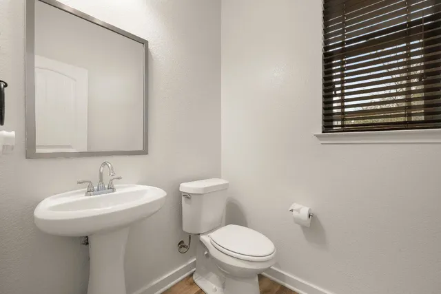 a bathroom with a sink and a toilet
