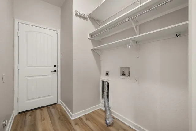 a view of entryway with wooden floor