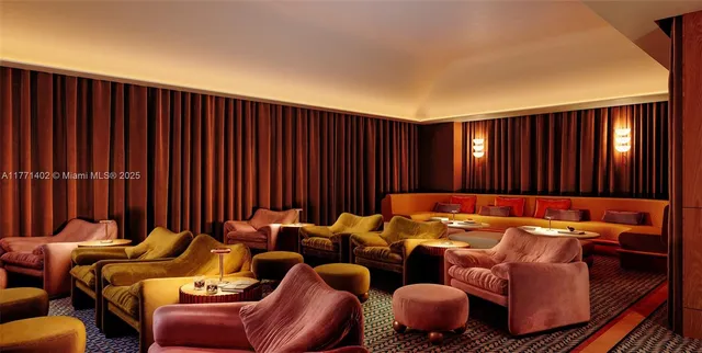 a room with furniture and gym equipment