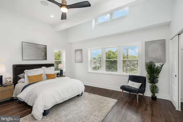 a bedroom with a bed and a chair