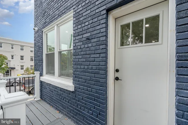 a view of a balcony with chairs