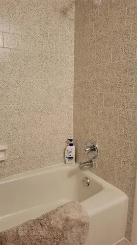 a bathroom with a bathtub