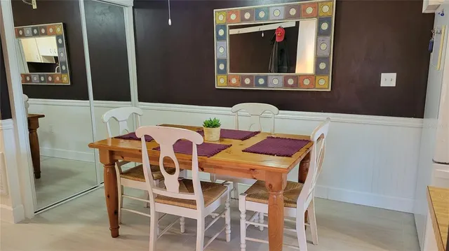 a view of a dining room with furniture