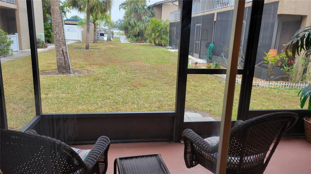 2938 Clark Road, Unit 104 Sarasota, FL 34231 - Photo 8 of 18 a view of balcony with furniture