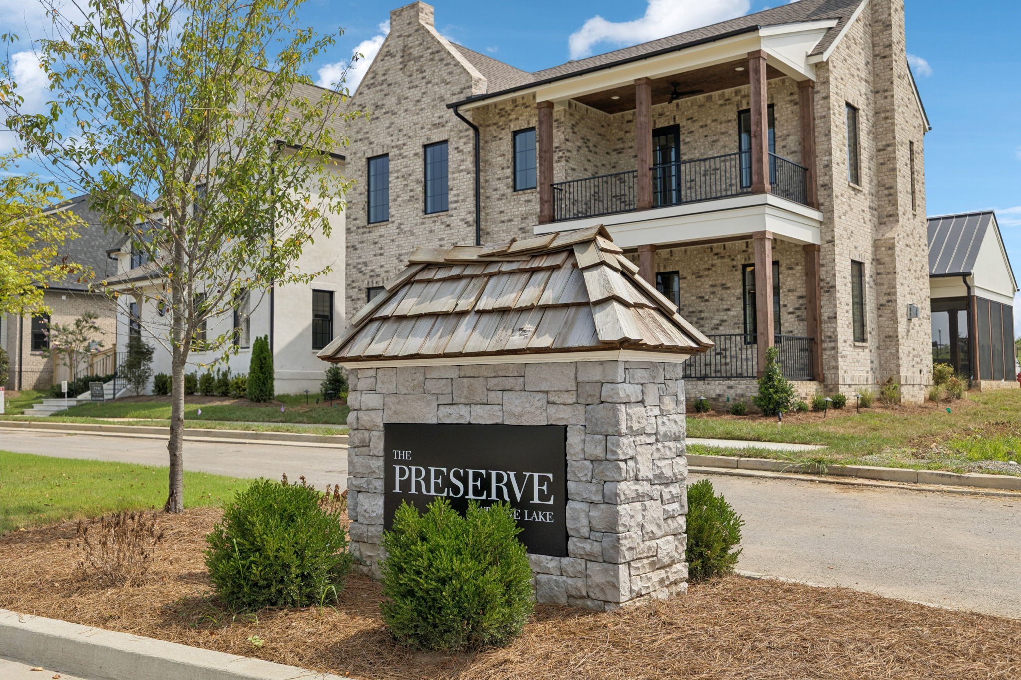 102 Cardiff Dr Spring Hill North Thompson's Station, TN 37179 - Photo 11 of 67 a front view of a house with a garden