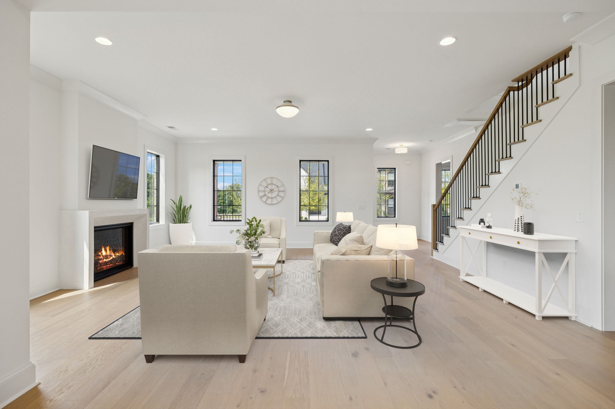 102 Cardiff Dr Spring Hill North Thompson's Station, TN 37179 - Photo 13 of 67 a living room with furniture and a fireplace