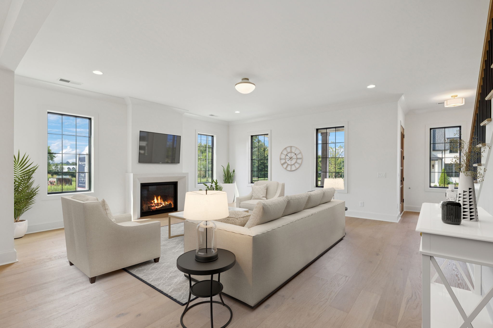 102 Cardiff Dr Spring Hill North Thompson's Station, TN 37179 - Photo 15 of 67 a living room with furniture and a fireplace