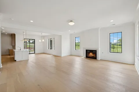 a view of a kitchen with furniture and a window