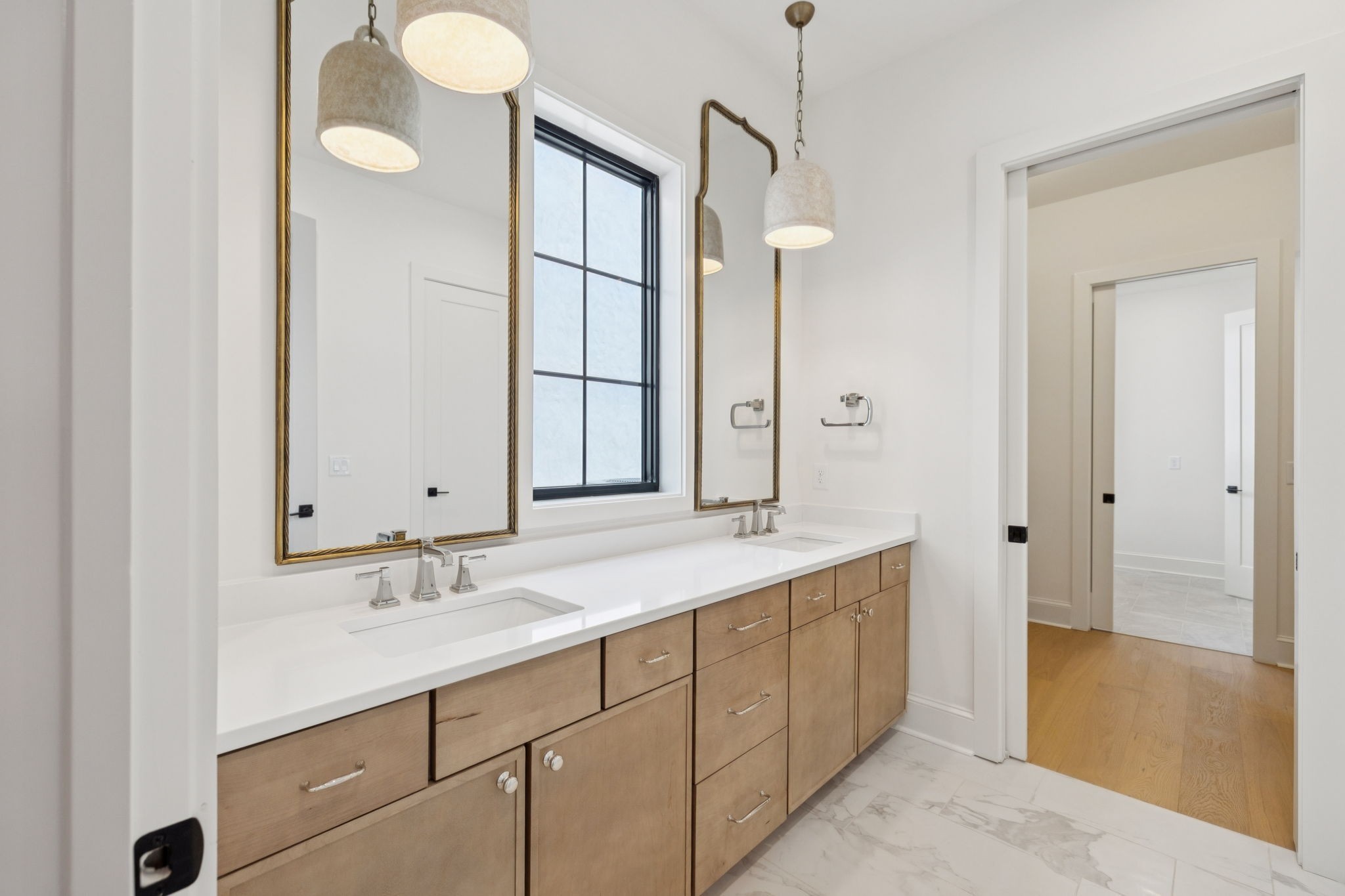 102 Cardiff Dr Spring Hill North Thompson's Station, TN 37179 - Photo 36 of 67 a bathroom with a double vanity sink mirror and shower
