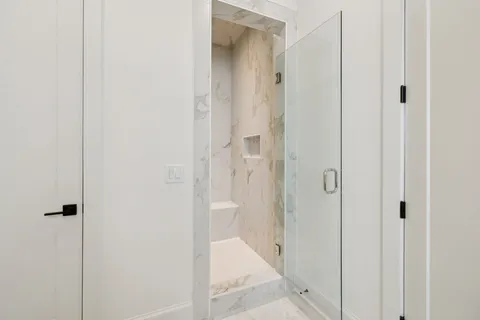 a bathroom with a toilet sink and bathtub