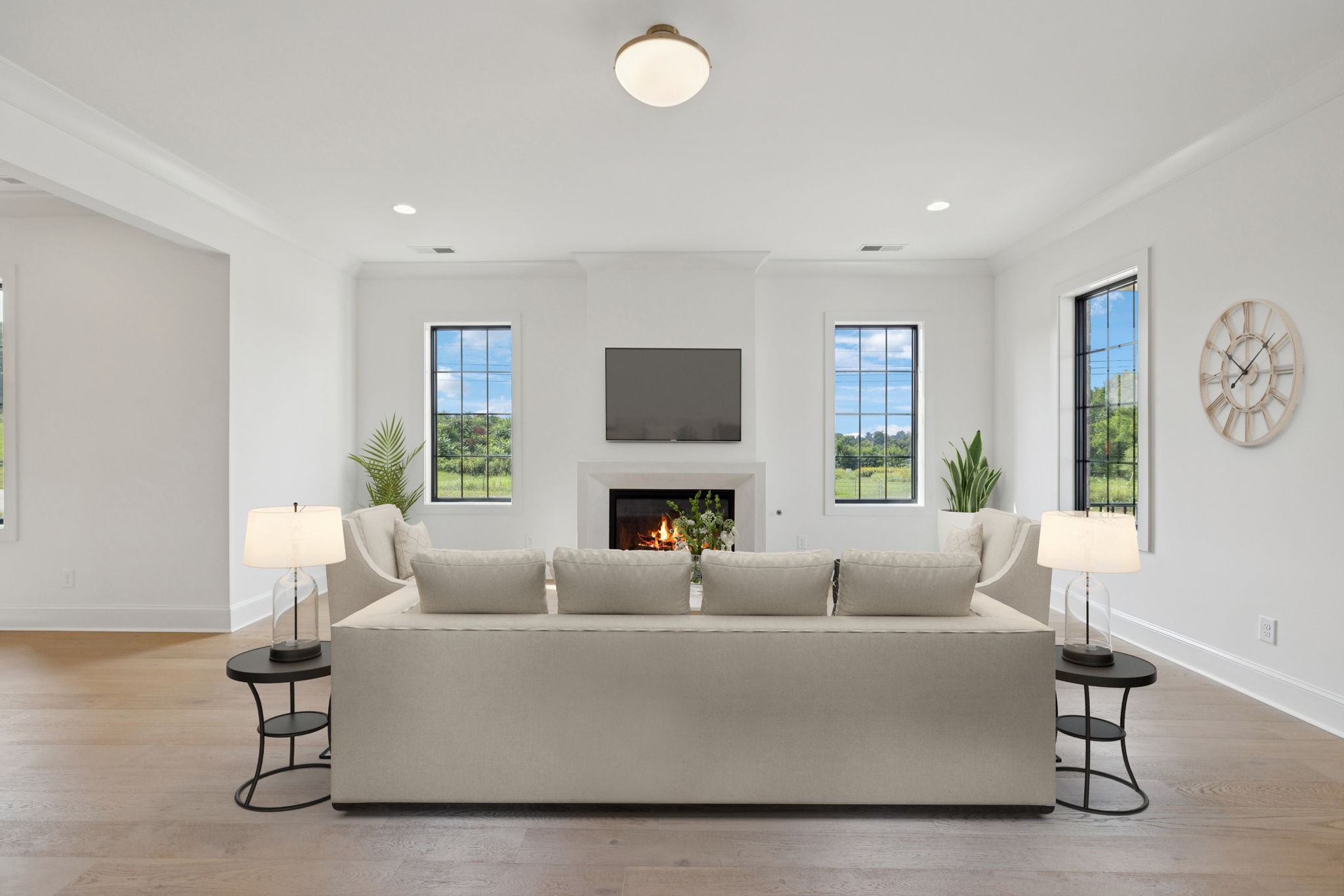 102 Cardiff Dr Spring Hill North Thompson's Station, TN 37179 - Photo 4 of 67 a living room with furniture a fireplace and a large window