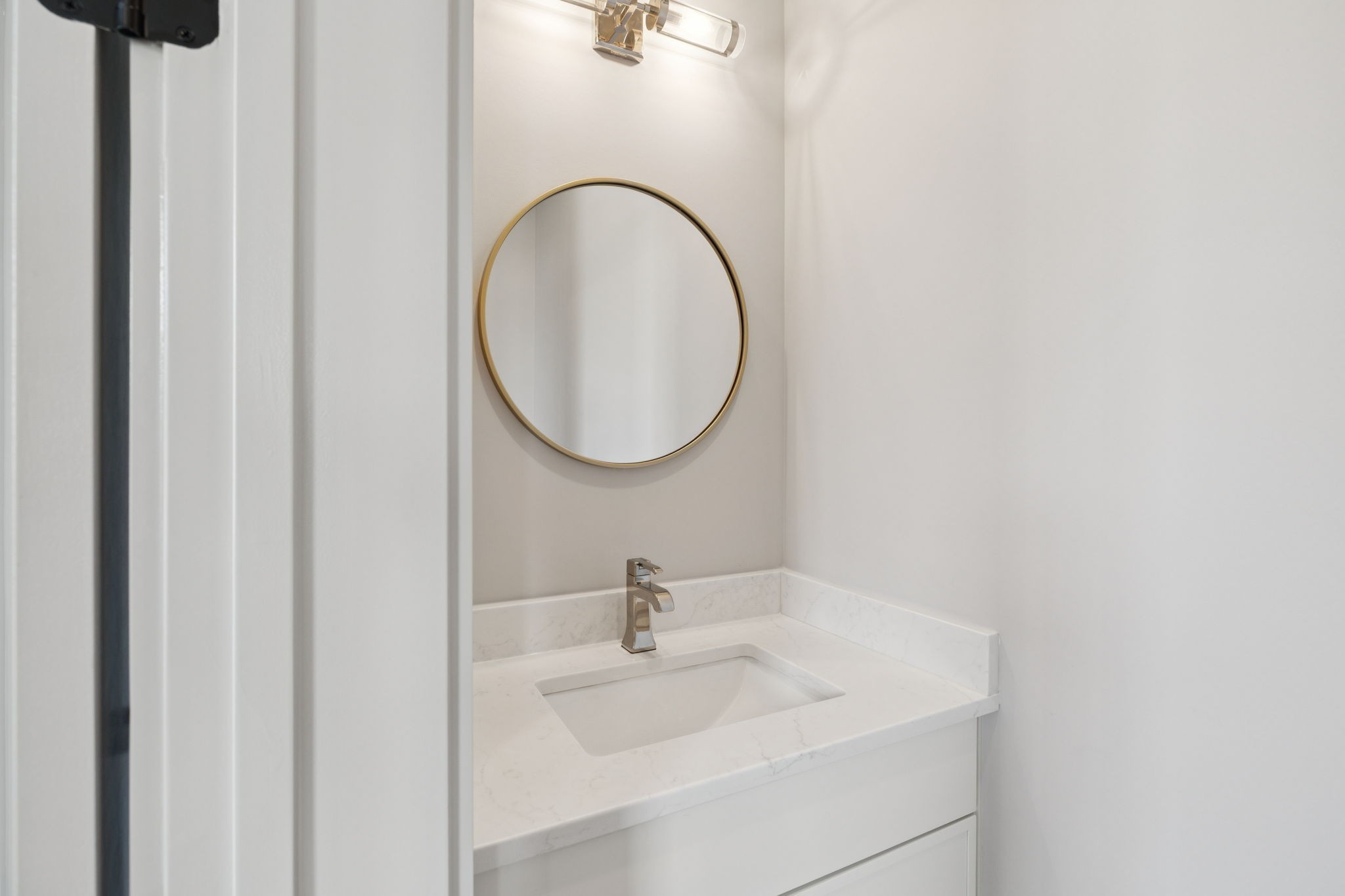 102 Cardiff Dr Spring Hill North Thompson's Station, TN 37179 - Photo 41 of 67 a bathroom with a sink and a mirror