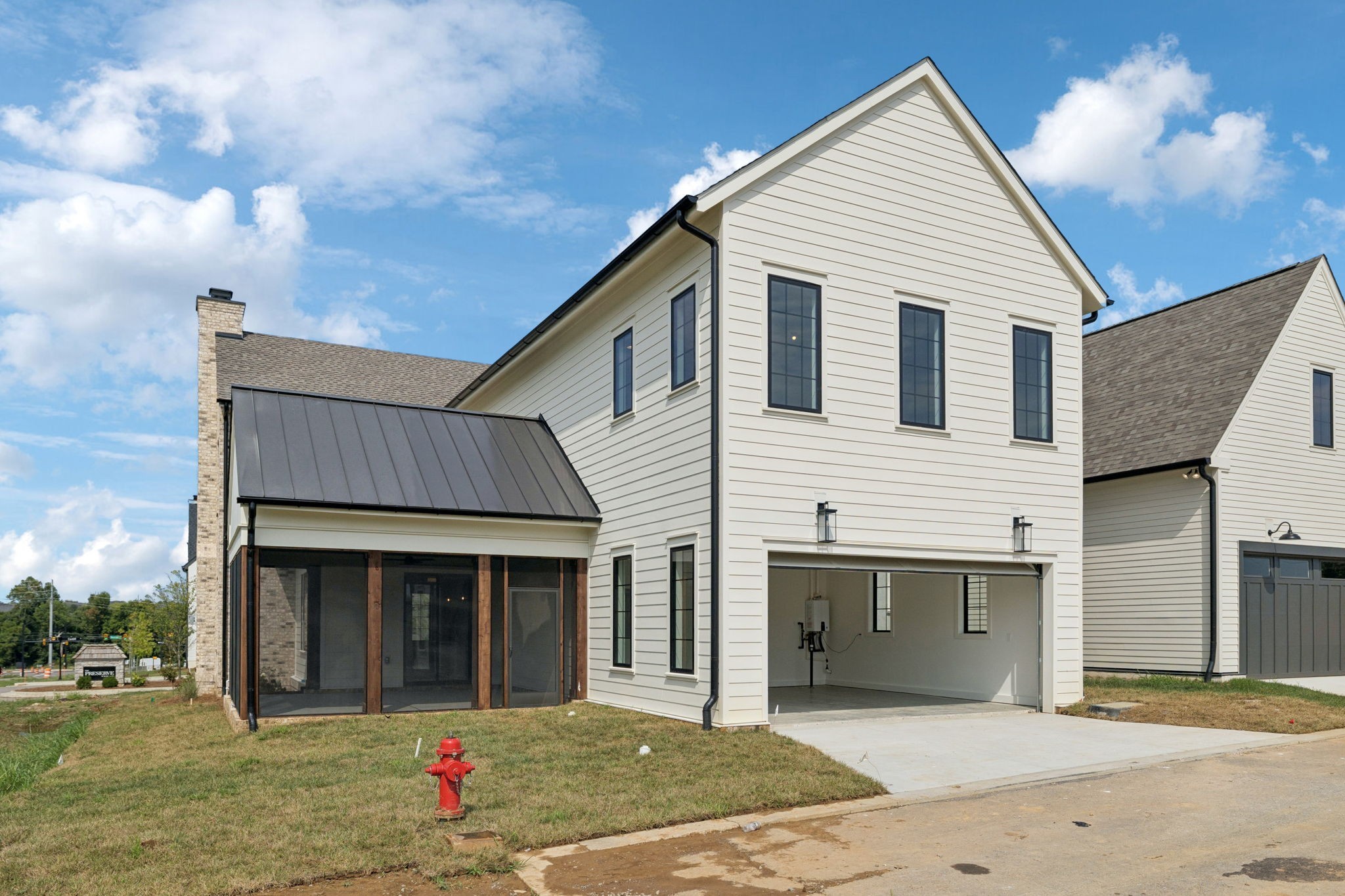 102 Cardiff Dr Spring Hill North Thompson's Station, TN 37179 - Photo 66 of 67 a view of a house with backyard