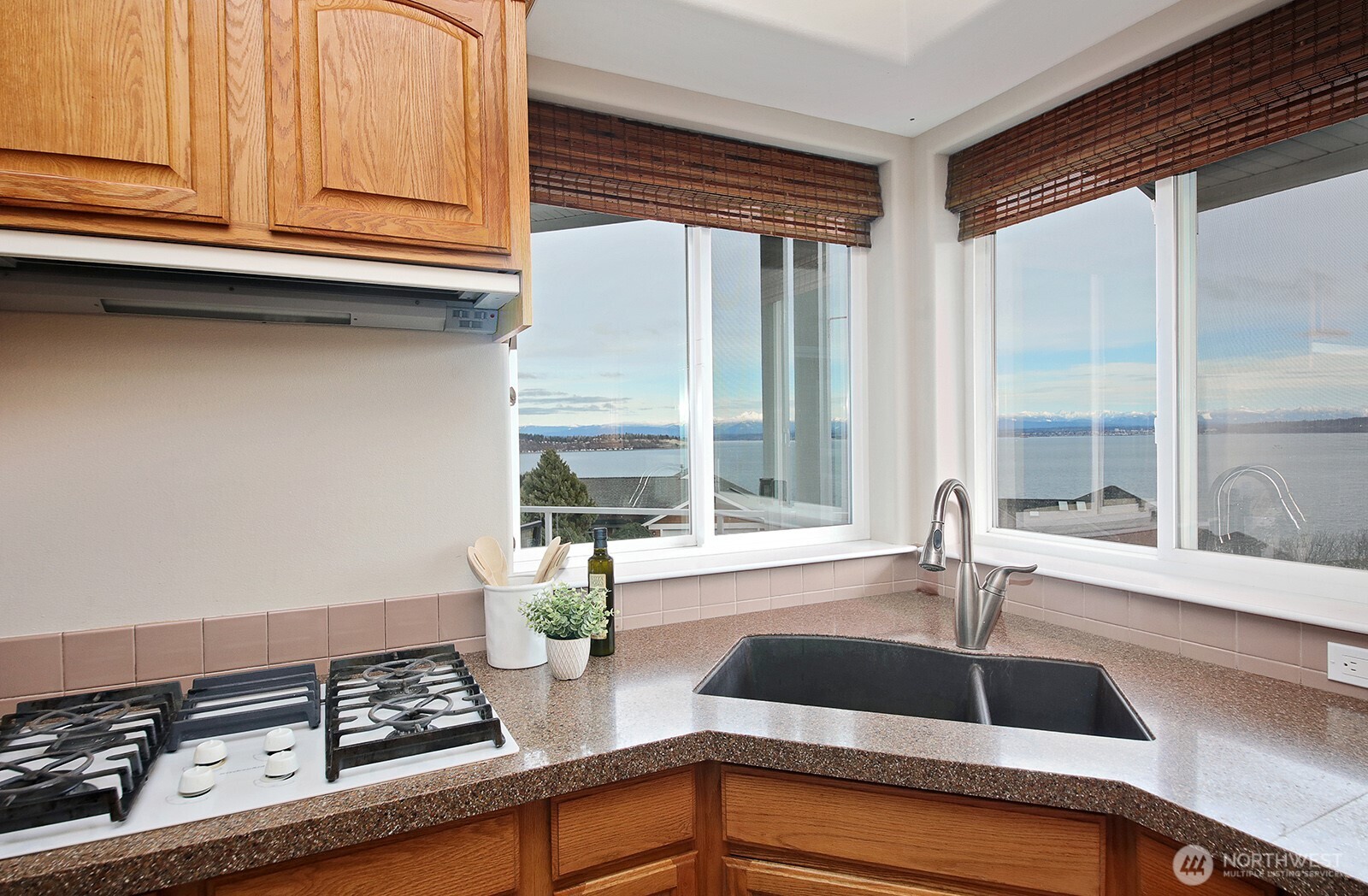4694 Wrightsman Place Clinton, WA 98236 - Photo 7 of 38 a kitchen with a sink and a window