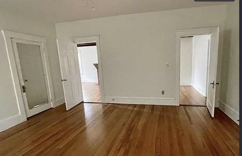 24 Somerset Street, Unit 2 Worcester, MA 01609 - Photo 11 of 16 a view of empty room with wooden floor