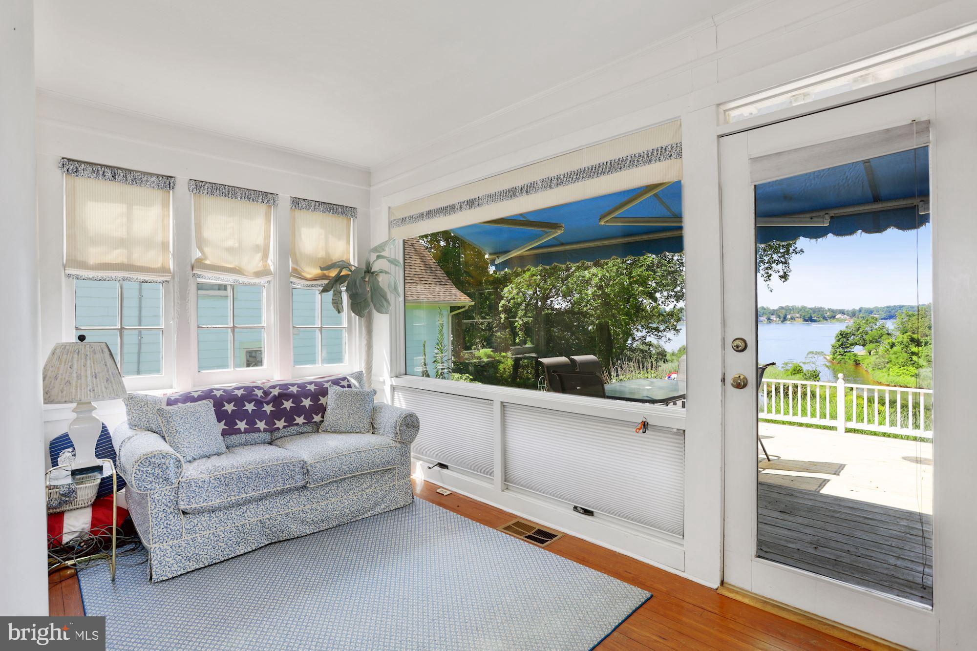 10 West Severn Ridge Road Annapolis, MD 21409 - Photo 17 of 31 Sunroom opens to the waterside deck