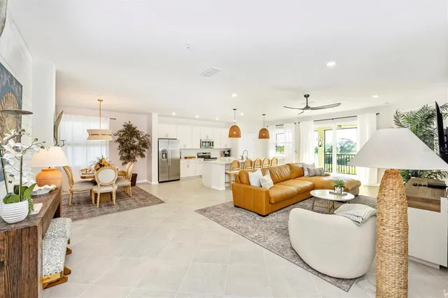 a dining room with furniture and window